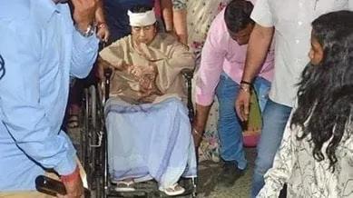 Mamata Banerjee on a wheelchair