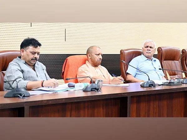 Yogi Holds Review Meeting 