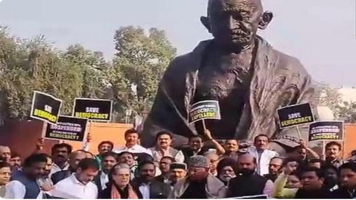 INDIA bloc MPs protesting in front of Gandhi statue