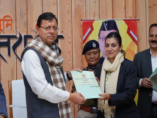 Uttarakhand CM Dhami offering appointment letter