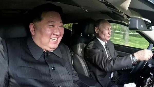 Vladimir Putin and Kim Jong Un