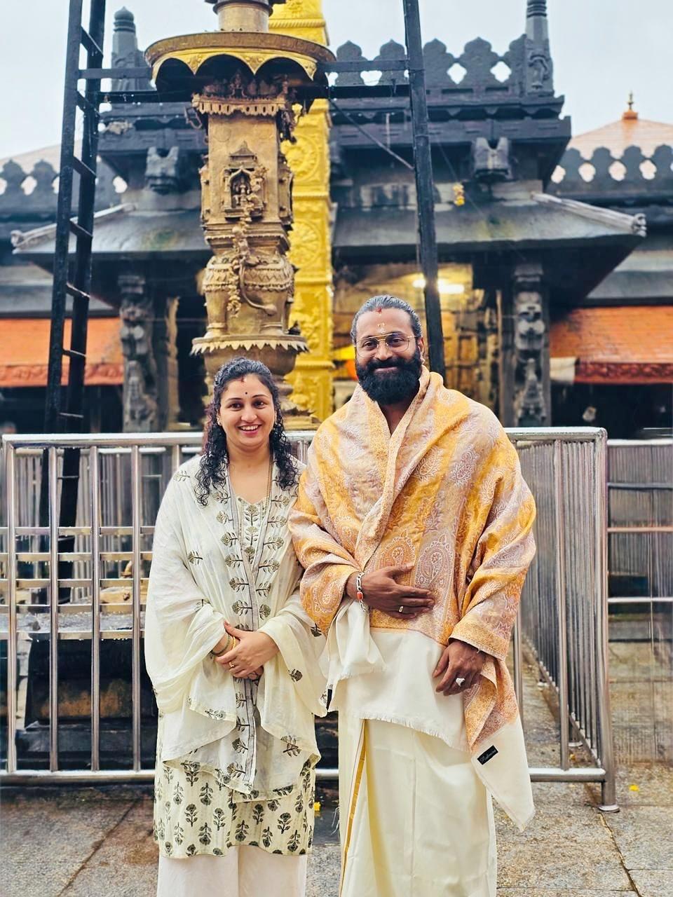 Rishab Shetty offers prayers at the Kollur Shri Mookambika Devi Temple with wife Pragathi Shetty
