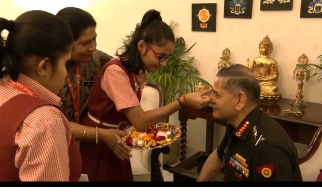 Schoolgirls tie 'rakhi' to Army Chief; military reaffirms its pledge to protect country