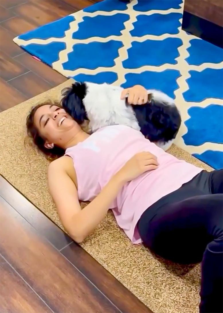 Keerthy Suresh's workout session interrupted by a cute intruder