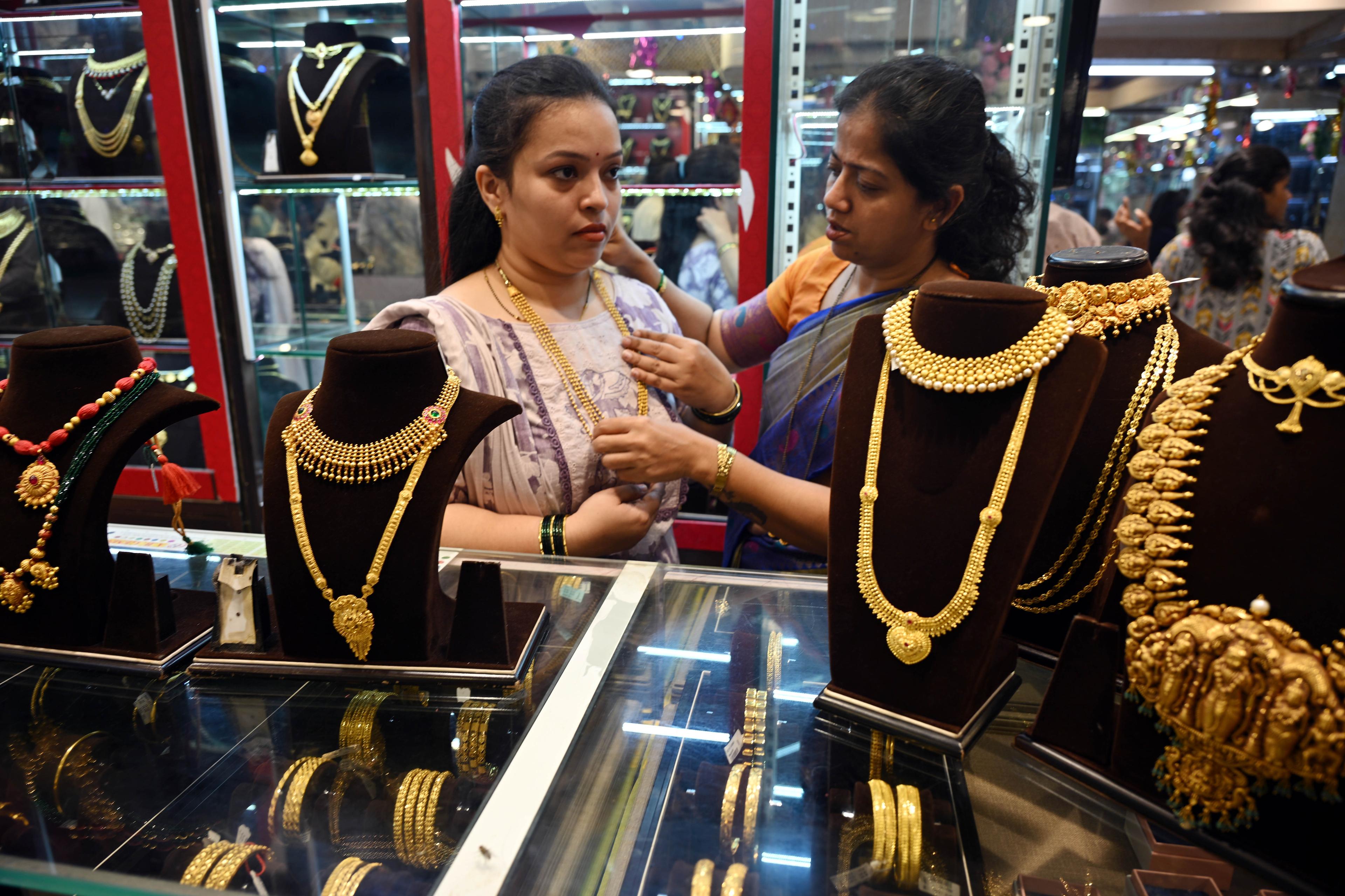 Gold prices see further drop as safe haven buying eases