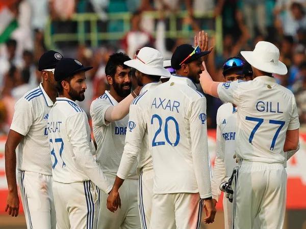Jasprit Bumrah with the teammates after taking a wicket