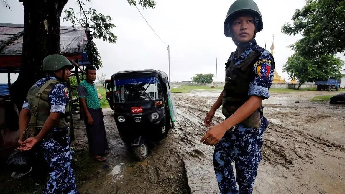 Myanmar police officer stands guard in Maungdaw, Rakhine