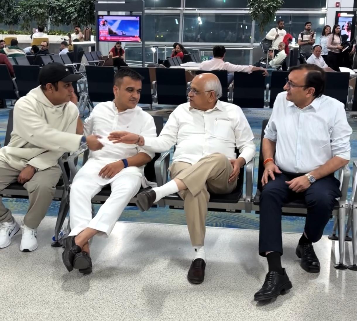 Gujarat CM, Deputy CM interact with people at Delhi airport