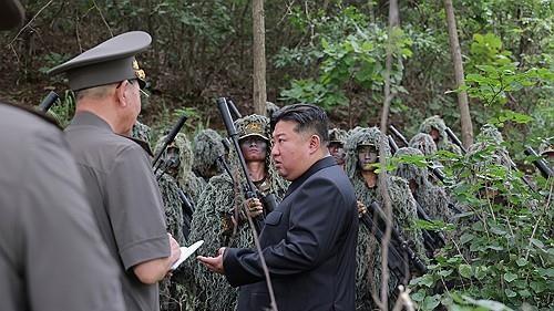 North Korea's Kim inspects sniper, special forces units at training base