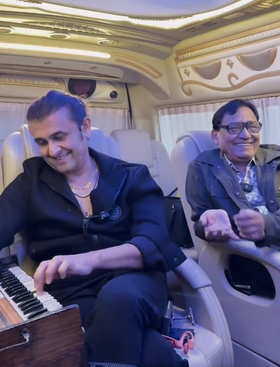 Sonu Nigam enjoys a fun jamming session with his father in the car