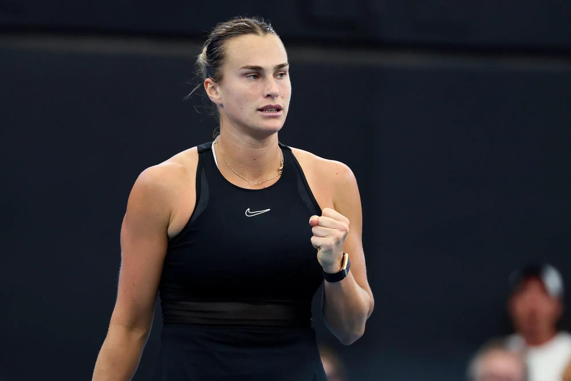 ryna Sabalenka of Belarus reacts after winning a point in her match against Lucia Bronzetti of Italy during the Brisbane International tennis tournament in Brisbane,