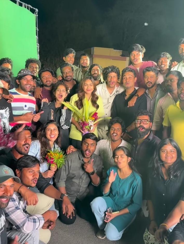 Mrunal Thakur celebrates with the cast & crew as she wraps up the shoot for 'Dacoit'